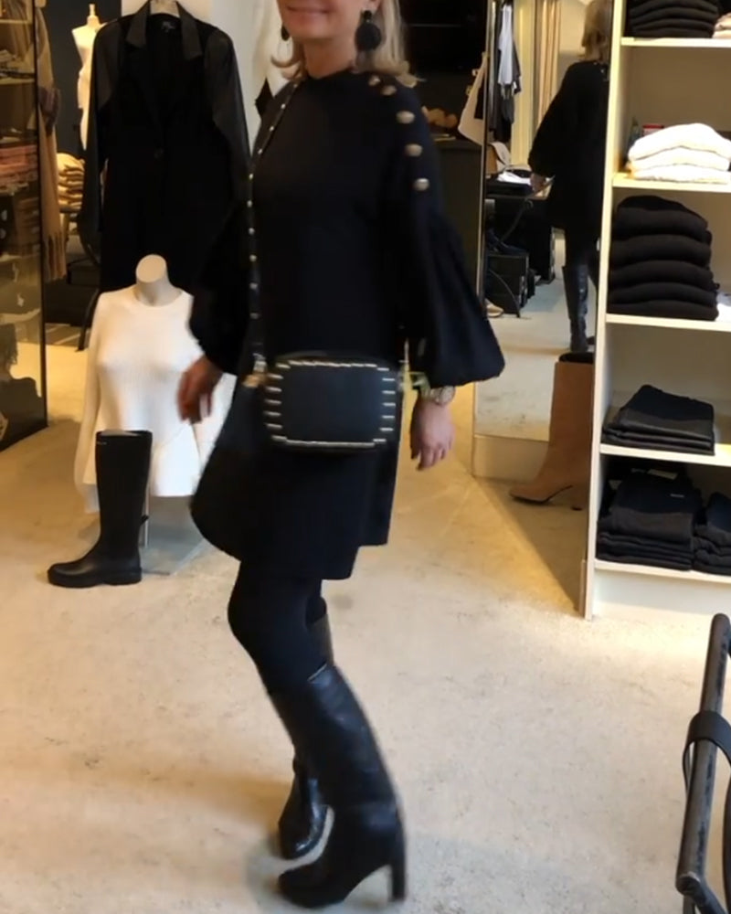 Classic black dress with lantern sleeves