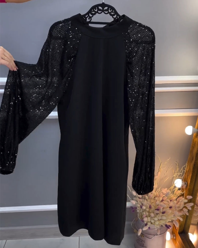 Solid color dress with patchwork sleeves