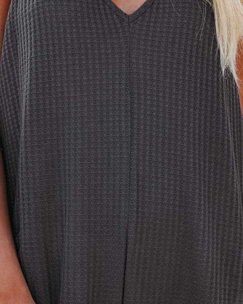 Solid color v-neck suspender pocket jumpsuit